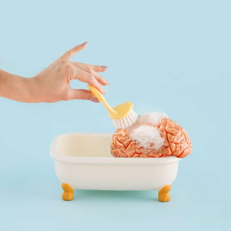 Hand,Of,Young,Woman,Washing,Human,Brain,With,Brush,In