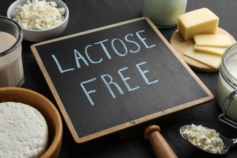 Dairy,Products,And,Board,With,Phrase,Lactose,Free,On,Black